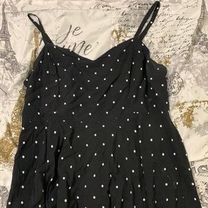 Black polka dot dress.